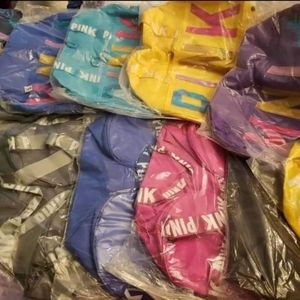 Pink spend da night bags